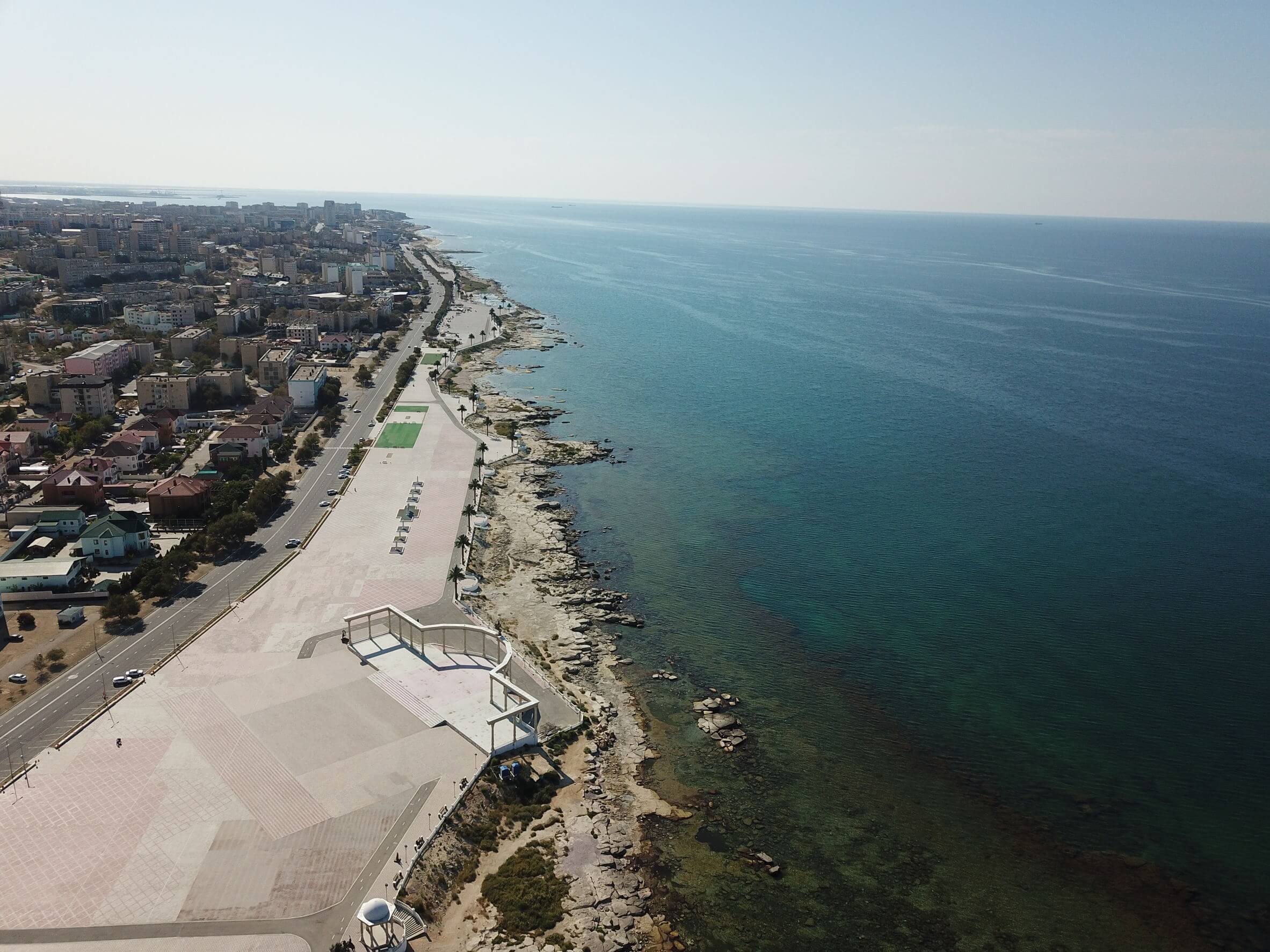 Aerial view of Aktau coast, city, and the Caspian Sea.