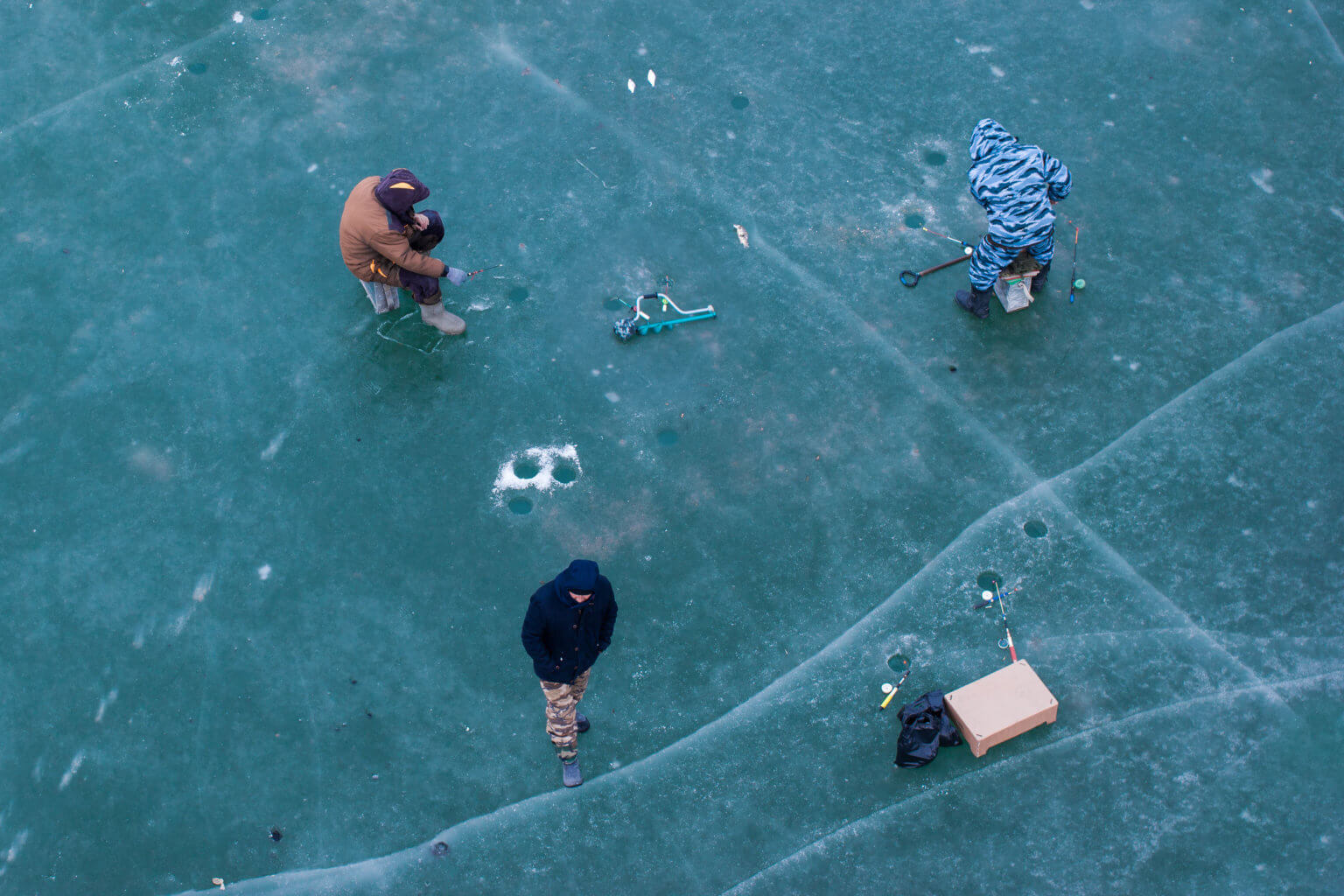 Ice fishermen on the Ural River.