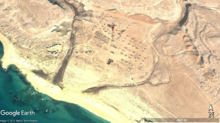 Close-up satellite view of the ruins of Soviet fishing village Saura.