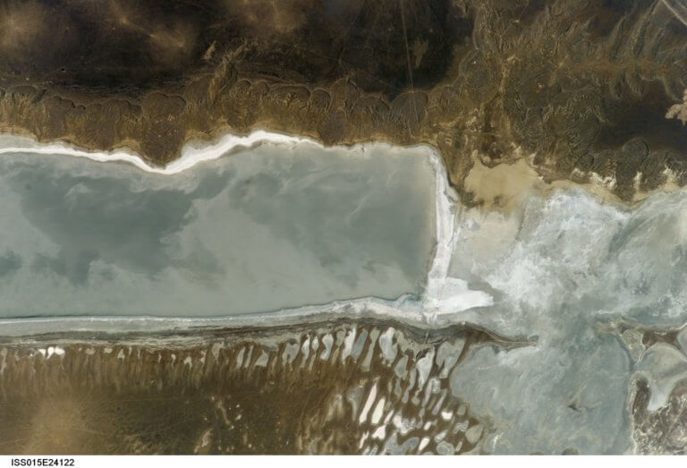 Space photo of Kaydak Bay's southern end with water.