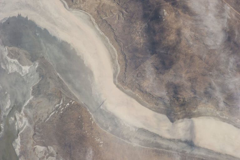 A dried-up Kaydak Bay showing salt flats.