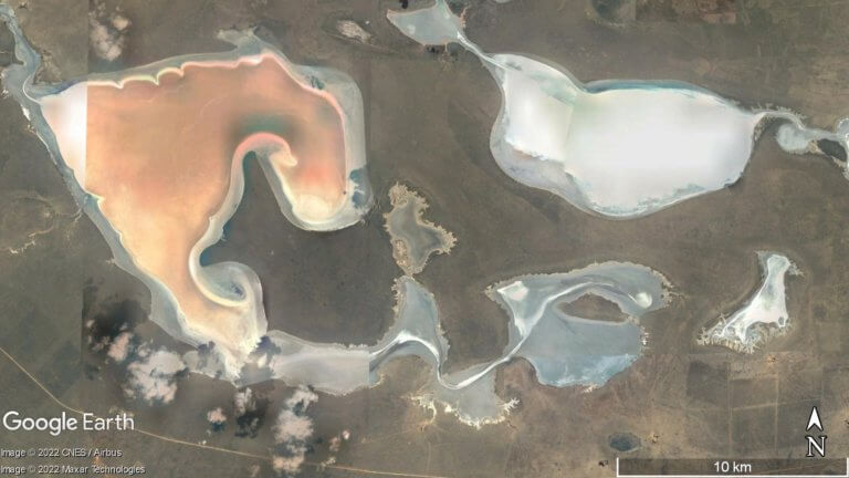 Satellite view of the orange rust colored Aralsor and nearby salt lakes.