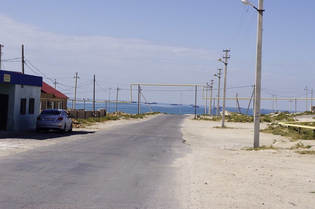 An empty road in Bautino, leading to the Caspian Sea.
