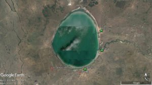 Satellite overview of a bright green-coloured Shalkar Lake.