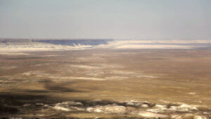 Karagiye Depression flat plain and long cliffs